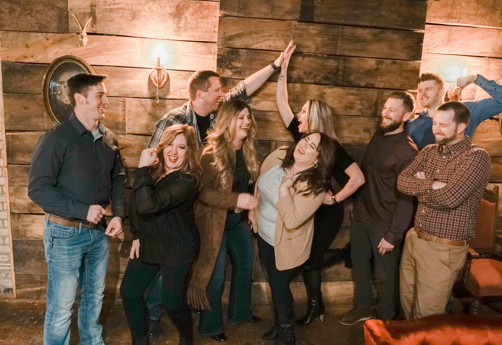 Leighton Media team enjoying a light hearted moment together. 